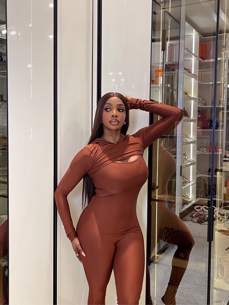 Two-Piece Sleeveless Jumpsuit With Hooded Overlay Top